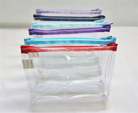 clear vinyl zippered pouches.